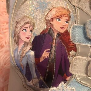 Frozen light up snow boots.